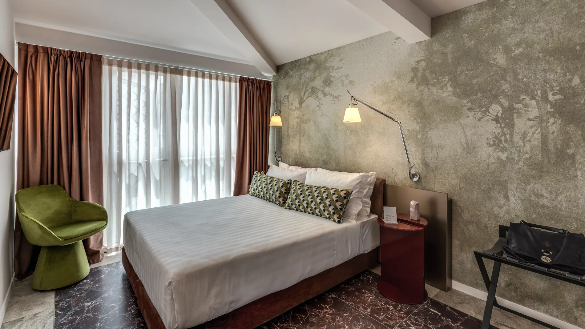 Modern Junior Suite with double bed, green armchair and large bright window in central Rome - Barberini 16, BZAR hotels in Rome