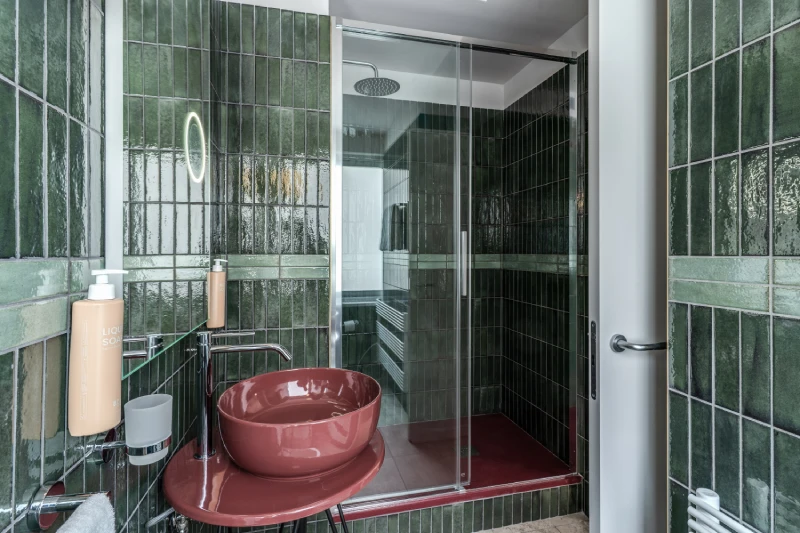 Modern shower with glass enclosure and designer sink in bathroom near Palazzo Barberini Rome - Barberini 16, BZAR hotels in Rome