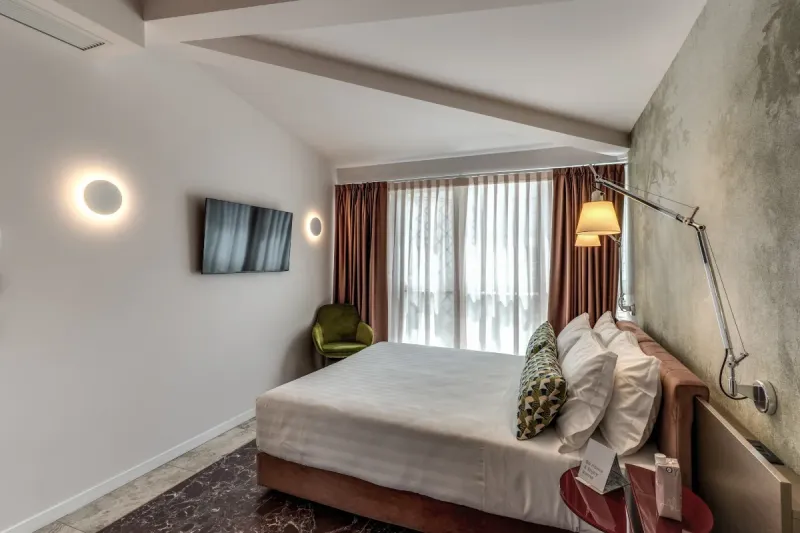 Junior Suite with double bed, TV and large window with blackout curtains in central Rome - Barberini 16, BZAR hotels in Rome- [view 1]
