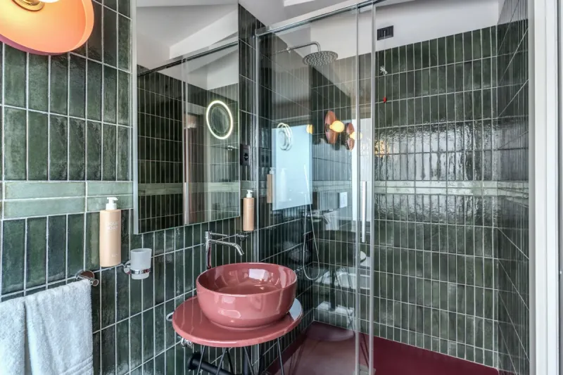 Modern Junior Suite bathroom with glass shower, designer sink and illuminated mirror in central Rome - Barberini 16, BZAR hotels in Rome