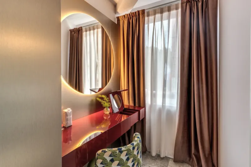 Designer desk with backlit mirror and window in modern Junior Suite in central Rome - Barberini 16, BZAR hotels in Rome